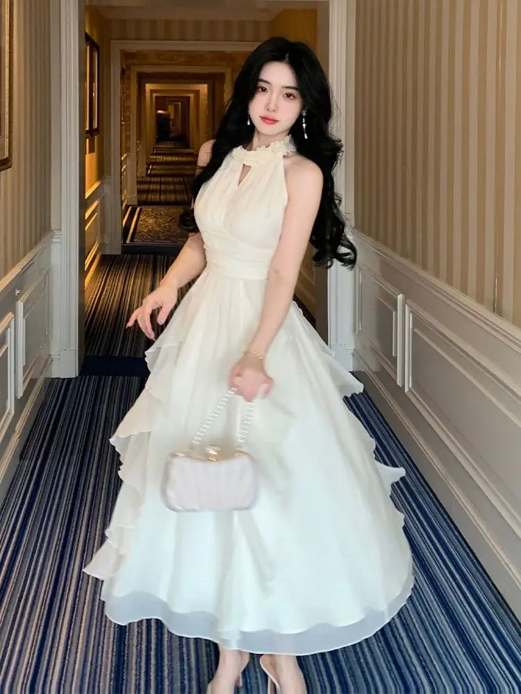 Elegant White Ruffled Halter Neck Evening Gown