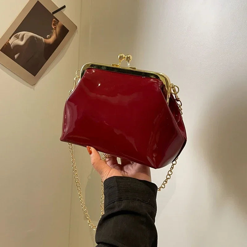 Red patent leather clutch bag sales