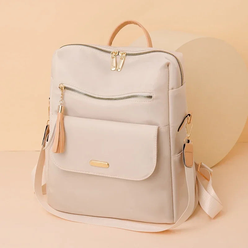 Stylish Beige Multifunctional Backpack With Gold Accents on  display picture 2