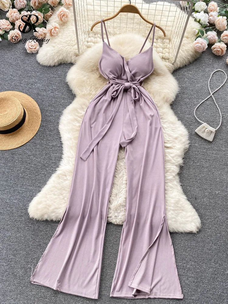Devine Printed Round Neck Sleeveless Tie Waist Jumpsuit