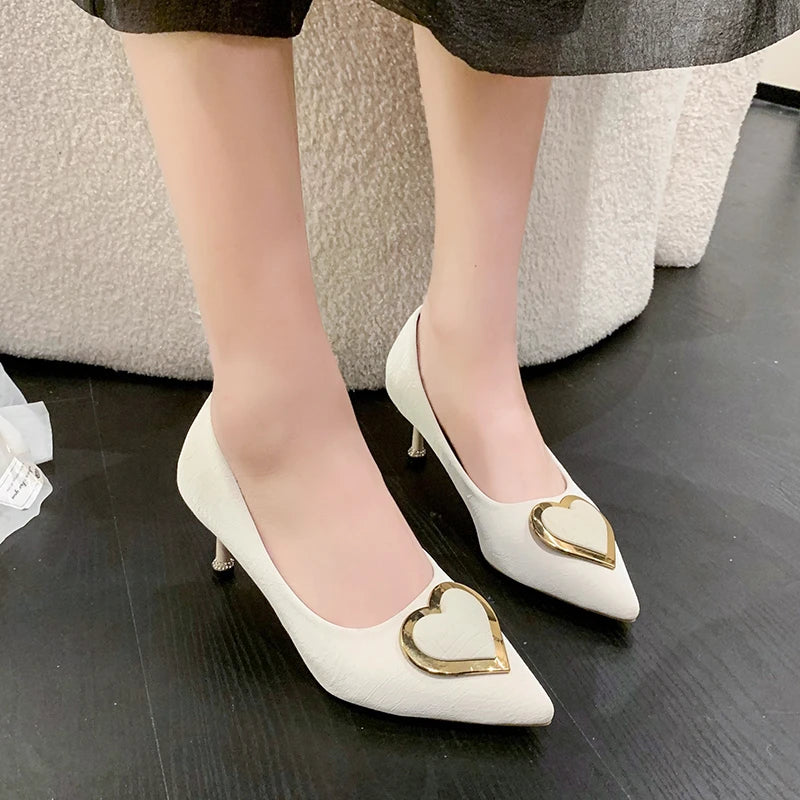 Chic White Heels With Gold Heart Accent